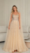 Front view of champagne sequin embellished tulle evening gown with cape sleeves