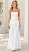 Front view of woman wearing white strapless floral lace maxi dress with scalloped neckline