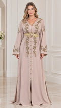 Front view of woman wearing Dusty Pink Moroccan embroidered kaftan maxi dress with gold belt