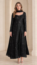 Front view of woman wearing black embellished long sleeve maxi Anarkali gown with matching scarf