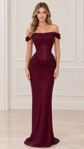 Front view of woman wearing burgundy off-the-shoulder corset glitter maxi dress