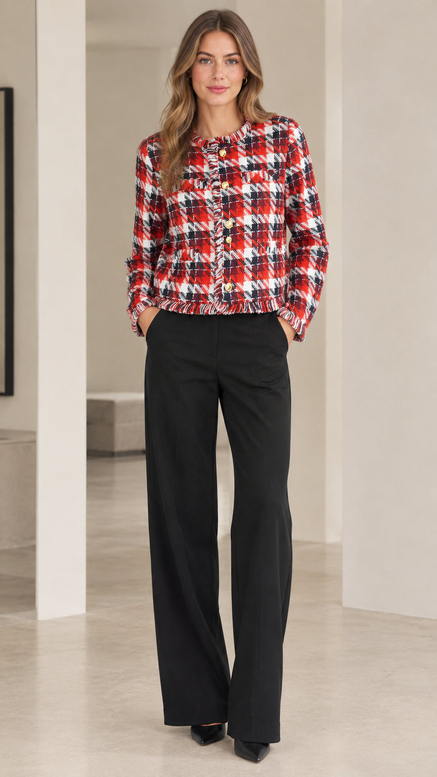 Front view of model wearing red and black plaid cropped tweed jacket with wide leg black pants