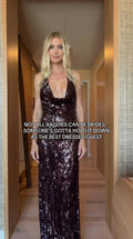 Front view of model wearing burgundy sequin cowl halter maxi evening gown