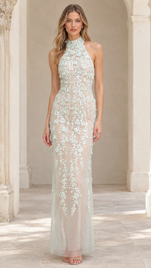 Front view of model wearing Sage Green 3D floral applique halter neck maxi evening gown