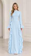 Front view of woman wearing Light Blue mock neck long sleeve maxi dress with side cascade ruffles