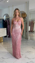 Dusty Rose halter neck corset maxi dress with 3D floral details and fringe skirt front view