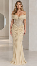 Front view of champagne off-the-shoulder beaded corset evening gown with draped skirt