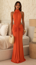 Orange halter cutout ruched maxi dress front view with draped waist detail