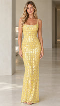 Front view of model wearing Yellow square neck sequin maxi gown