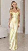 Front view of woman wearing butter yellow off-the-shoulder satin maxi dress