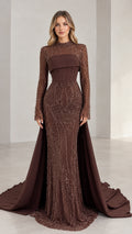 Front view of woman wearing brown beaded high neck evening gown with corset bodice and train