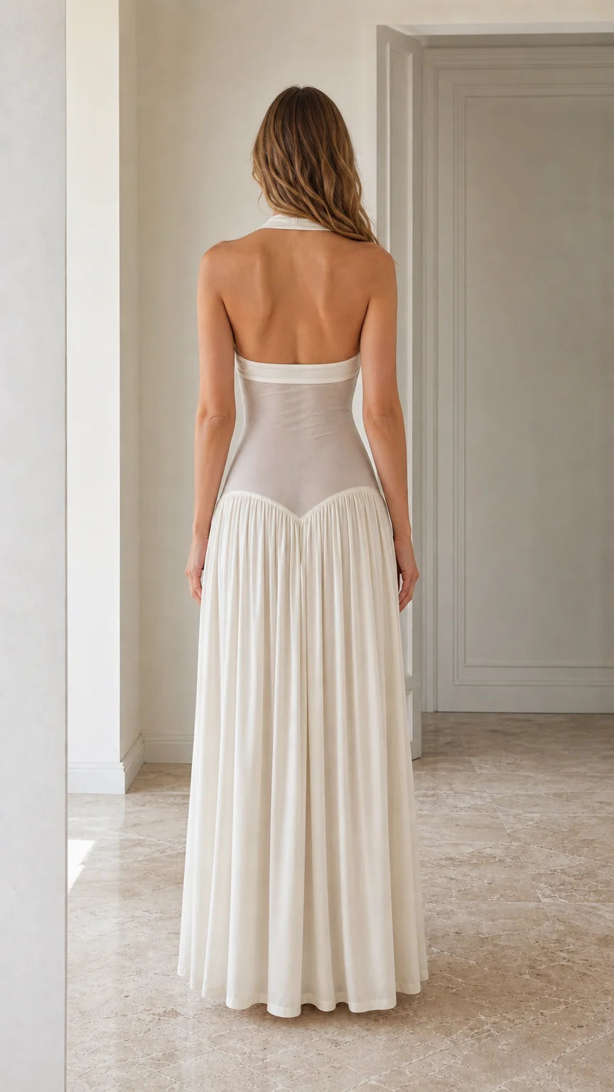 Back view of White halter neck maxi dress showing open back design