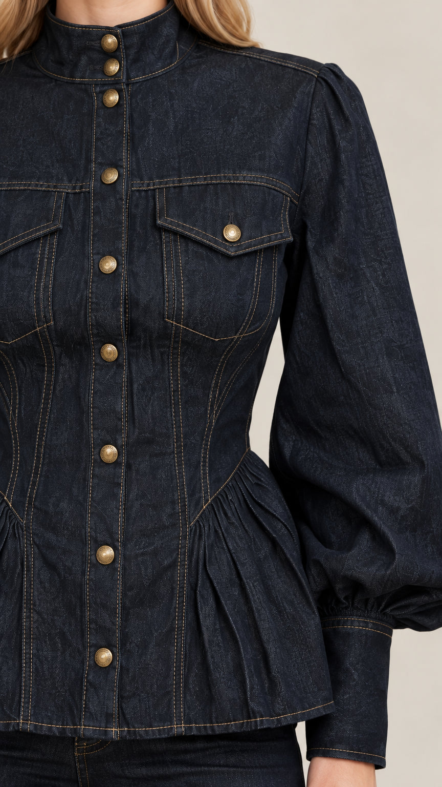 Close-up detail of Dark Indigo denim top showing stand collar, contrast stitching, and metallic buttons