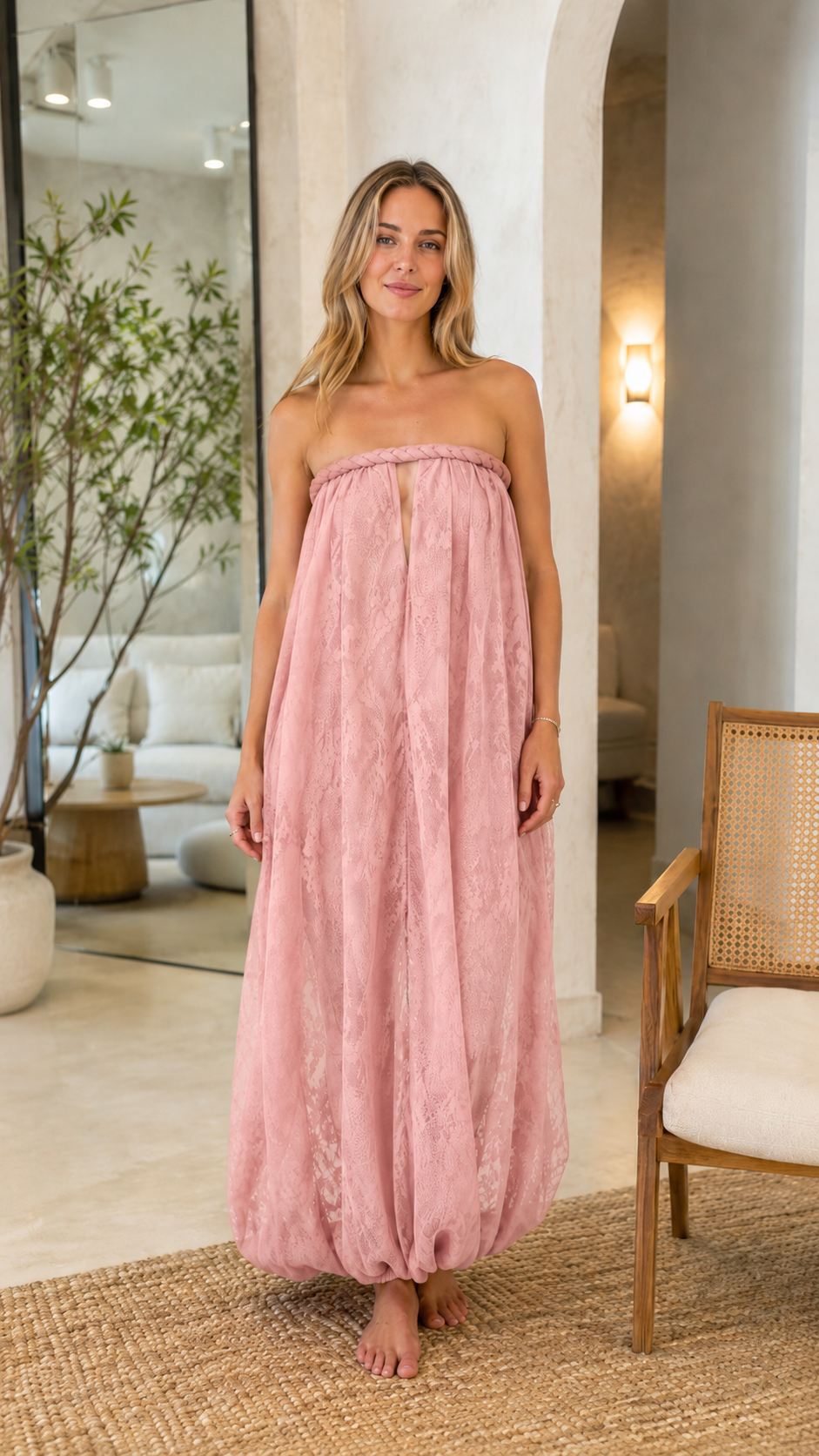 Front view of blush pink strapless textured maxi dress with keyhole front and bubble hem
